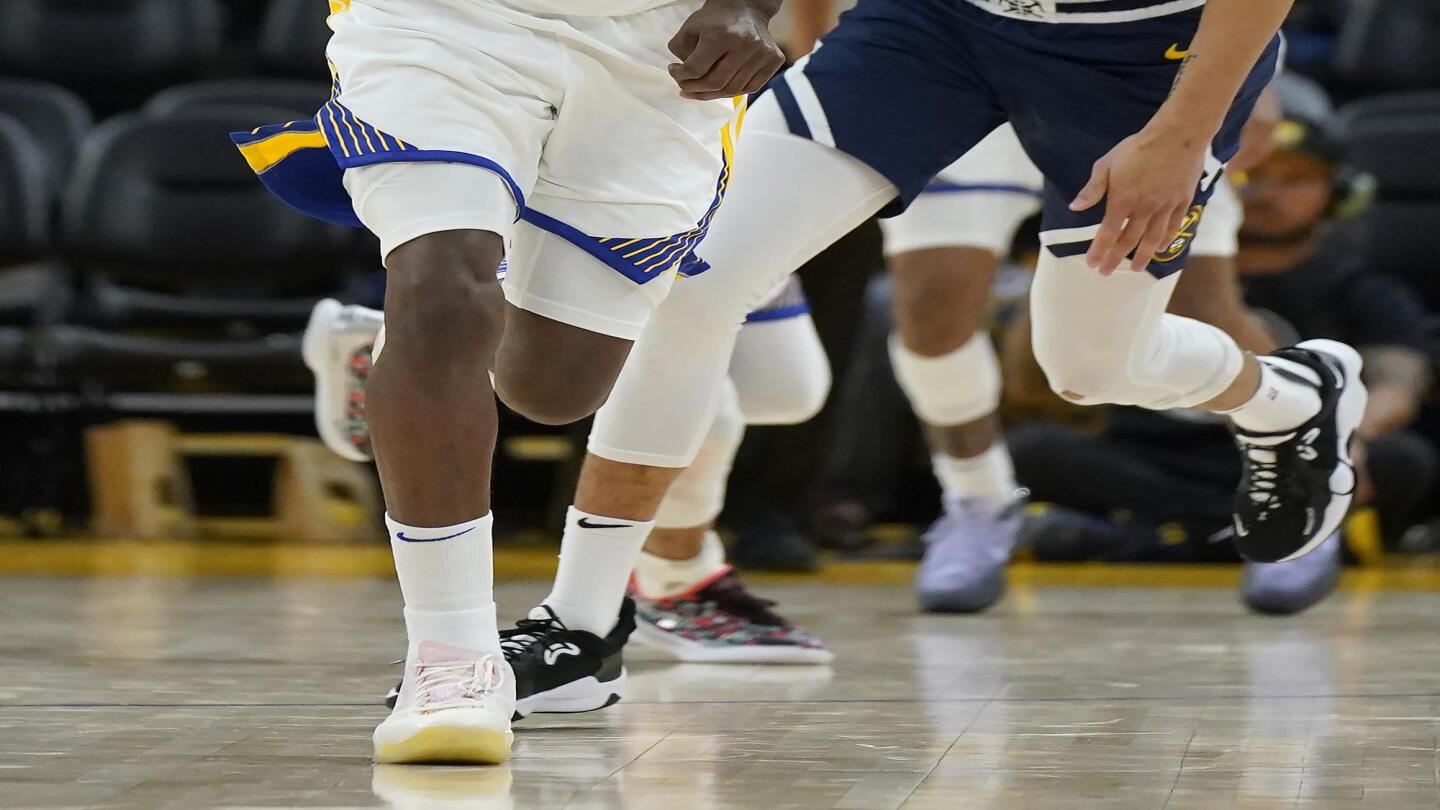 Forward Andrew Wiggins signs 4 year extension with Warriors AP News